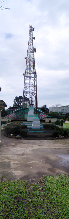 Vertical panorama shot of the park showing the Rizal monument, stage, and the Digitel tower